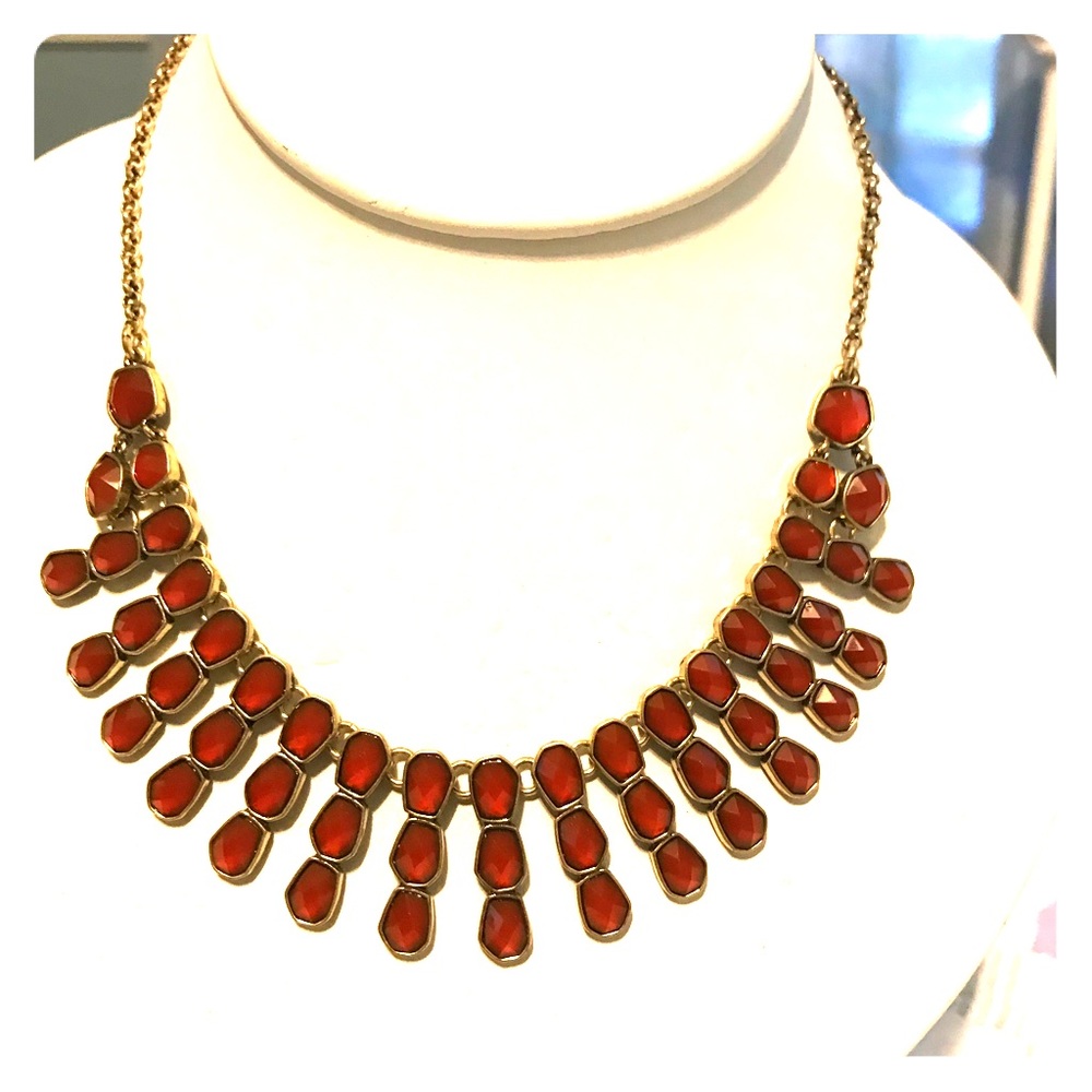 Goldtone necklace with adjustable chain.